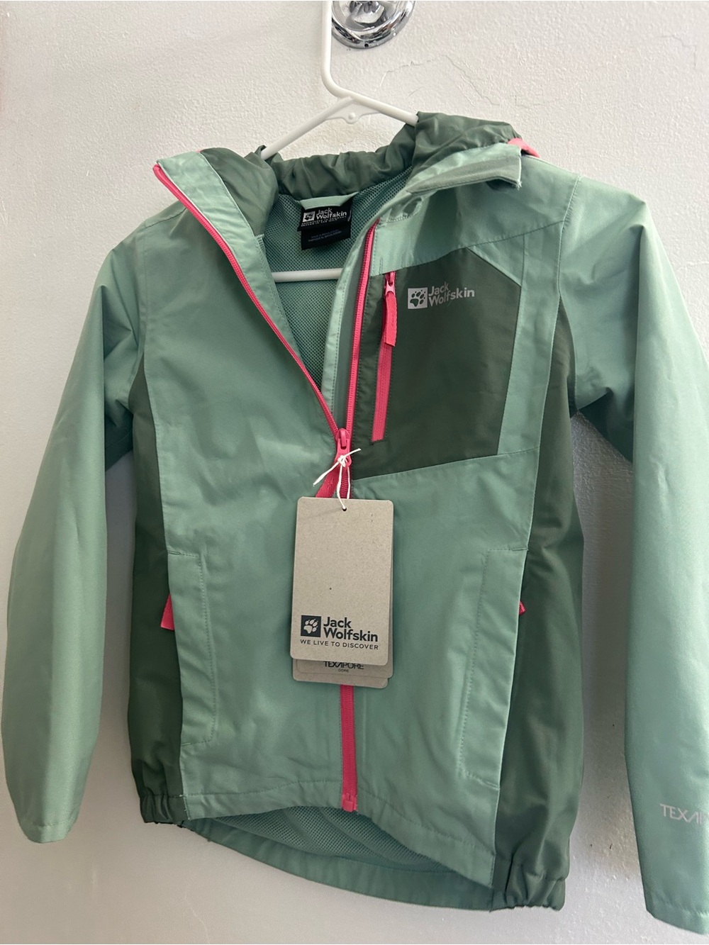 Jack Wolfskin Kids' Sage Green Rain Jacket with Pink Zipper Accents